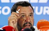 Italian Deputy Prime Minister and leader of far-right League party Matteo Salvini holds a crucifix as he speaks during his European Parliament election night event in Milan, Italy, May 27, 2019. REUTERS/Alessandro Garofalo