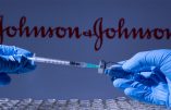 Toronto, Ontario, Canada - February 14, 2021 : A health worker prepares to administer a shot of the American vaccine Johnson and Johnson. Name is blurry and vials containing mRNA technology vaccine.